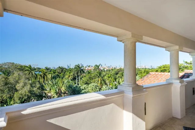 a bedroom with a bed a desk and book shelf