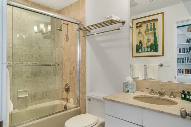 a living room with a book shelf