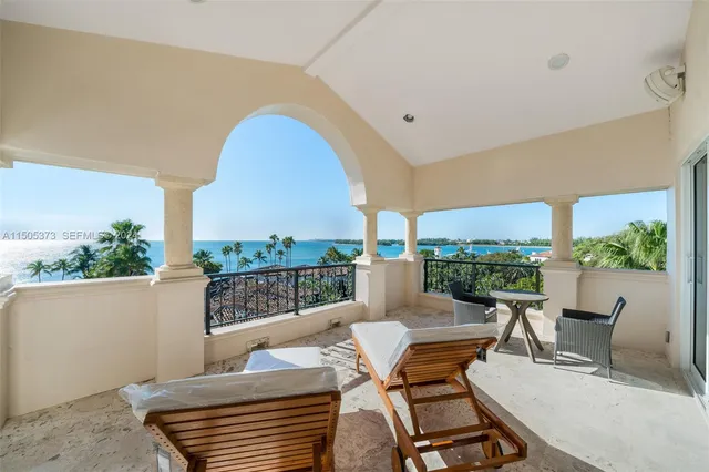 a view of a terrace with furniture and outdoor view