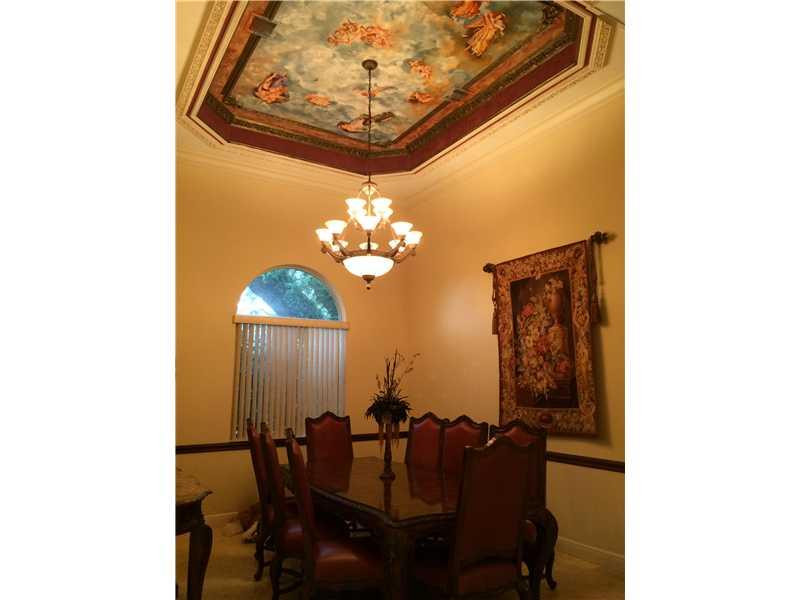 3700 Shady Ridge Road Fort Lauderdale, FL 33312 - Photo 11 of 17 a view of a dining room with furniture and wooden floor