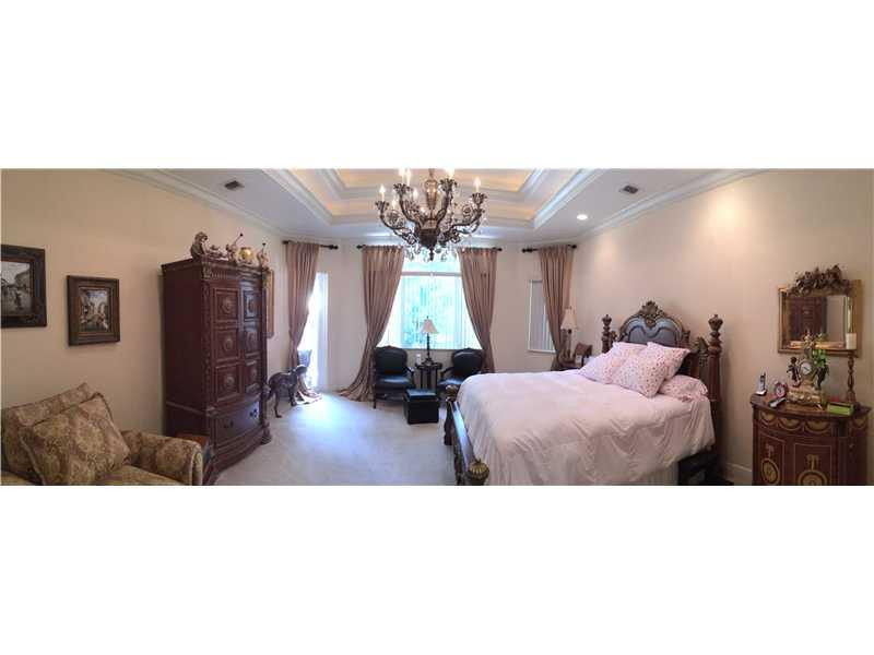 3700 Shady Ridge Road Fort Lauderdale, FL 33312 - Photo 12 of 17 a living room with furniture and a flat screen tv