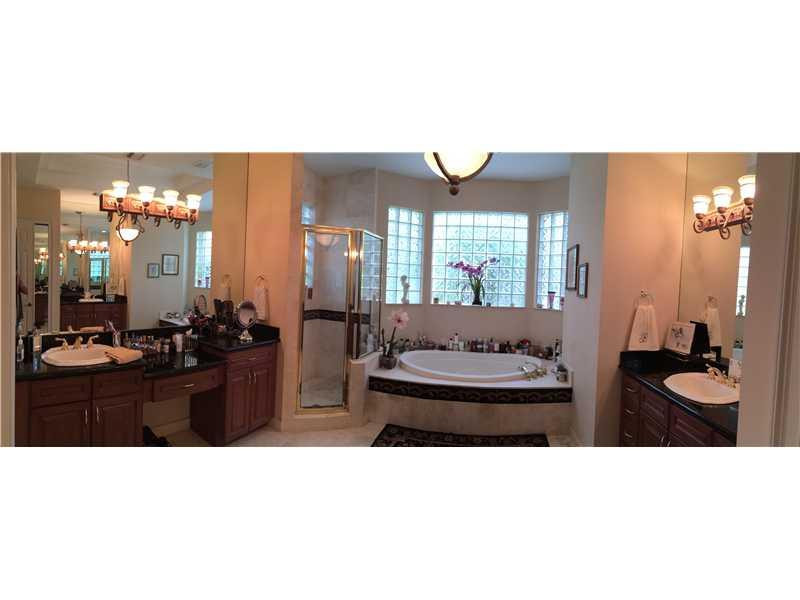 3700 Shady Ridge Road Fort Lauderdale, FL 33312 - Photo 13 of 17 a kitchen with a table and chairs in it