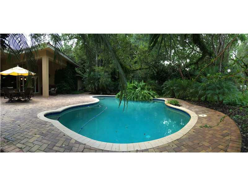 3700 Shady Ridge Road Fort Lauderdale, FL 33312 - Photo 17 of 17 a view of a swimming pool with a outdoor seating