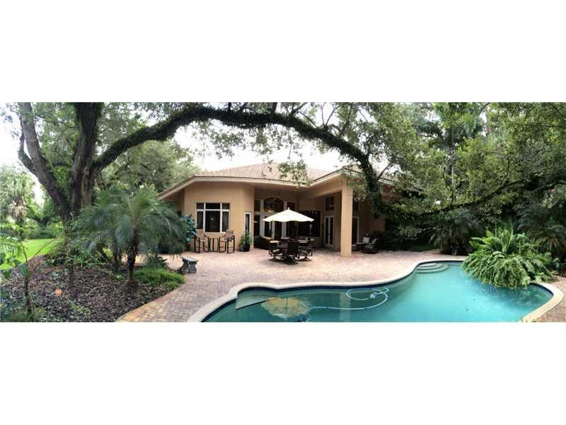 3700 Shady Ridge Road Fort Lauderdale, FL 33312 - Photo 4 of 17 a view of house with backyard garden and swimming pool