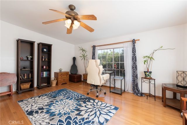 a living room with furniture rug and window