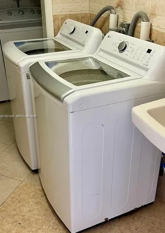 a utility room with dryer and washer