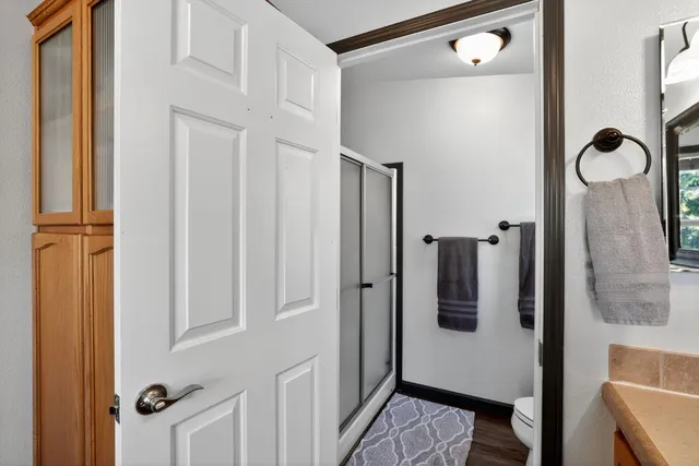 a house with trees in the background