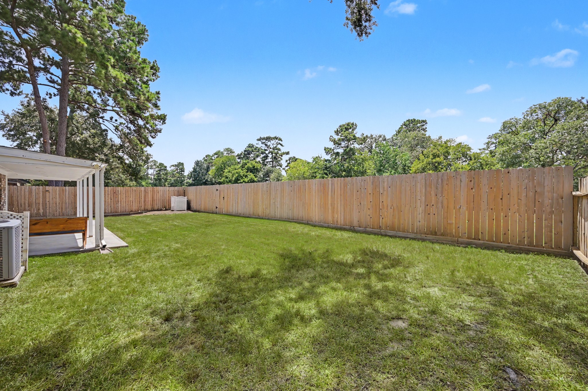 17019 Fordingbridge Court Spring, TX 77379 - Photo 25 of 26 Mature trees add a natural backdrop, while the absence of rear neighbors creates an especially private and peaceful setting. A fantastic outdoor extension of the home with plenty of possibilities!