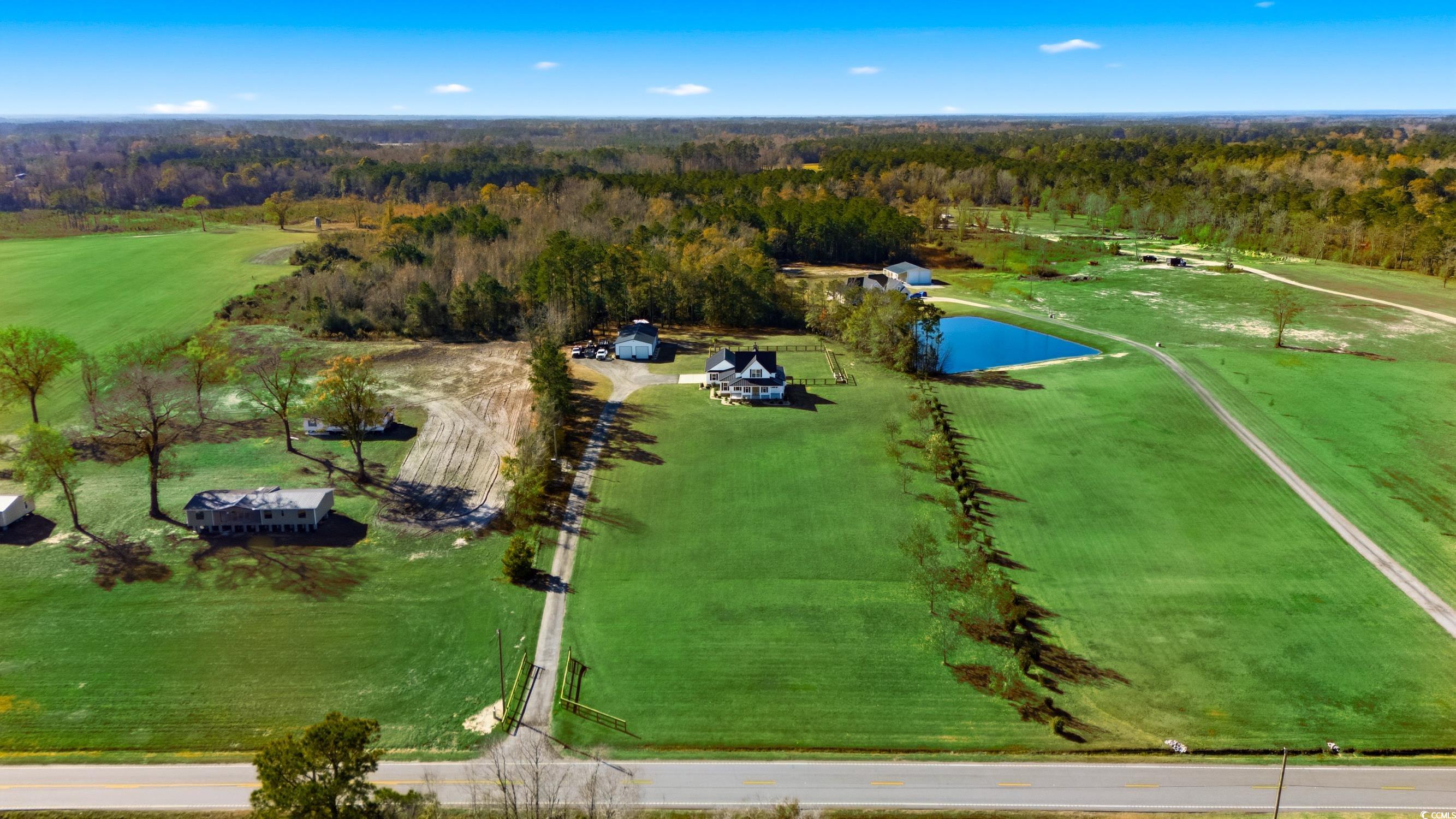 851 Dog Bluff Road Galivants Ferry, SC 29544 - Photo 25 of 25 View of rural area with a large body of water and a heavily wooded area