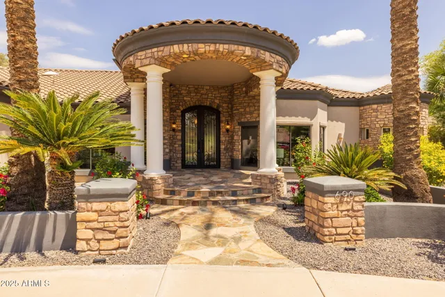 a view of a building with potted plants