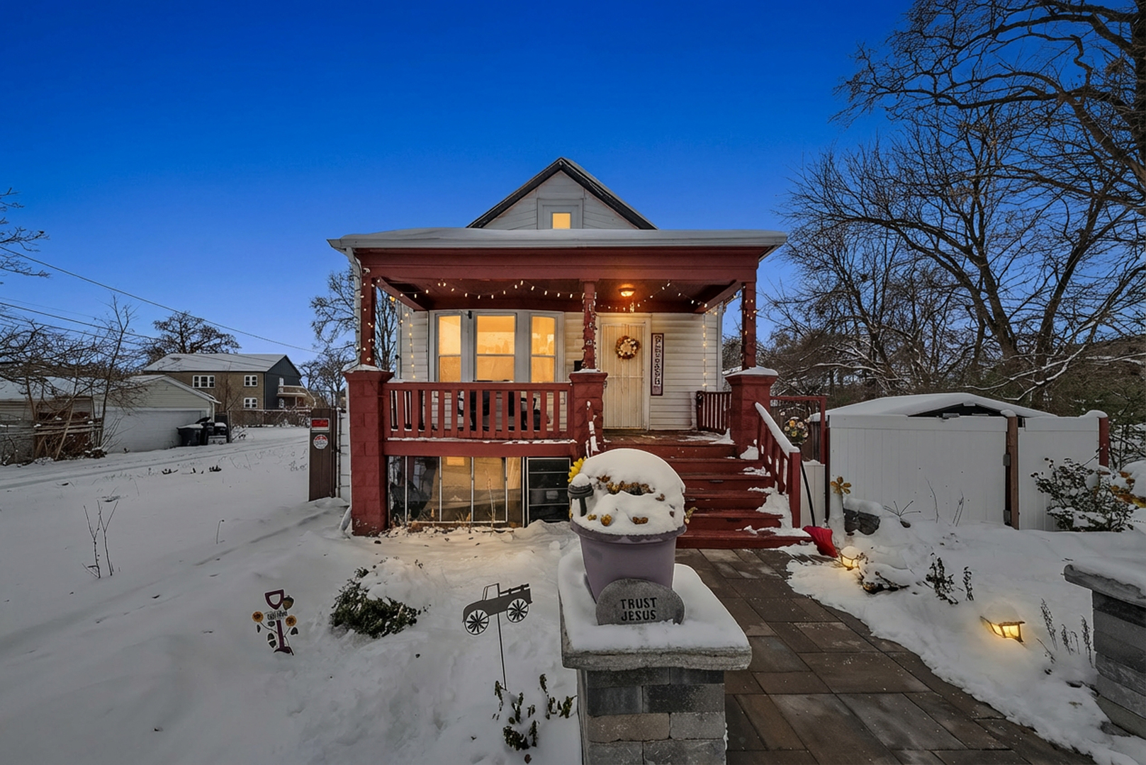 149 East 120th Street Chicago, IL 60628 - Photo 2 of 18 a front view of a house with a yard