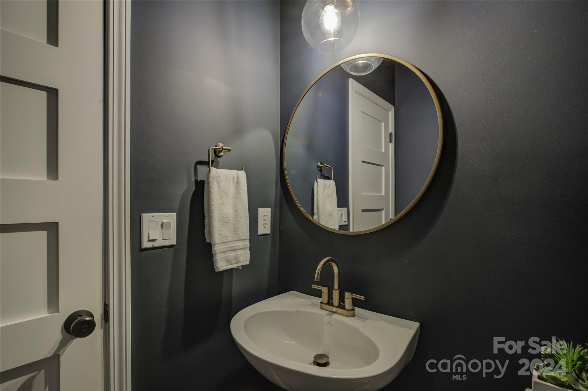 3478 Richard's Crossing Fort Mill, SC 29708 - Photo 11 of 30 a bathroom with a sink and mirror
