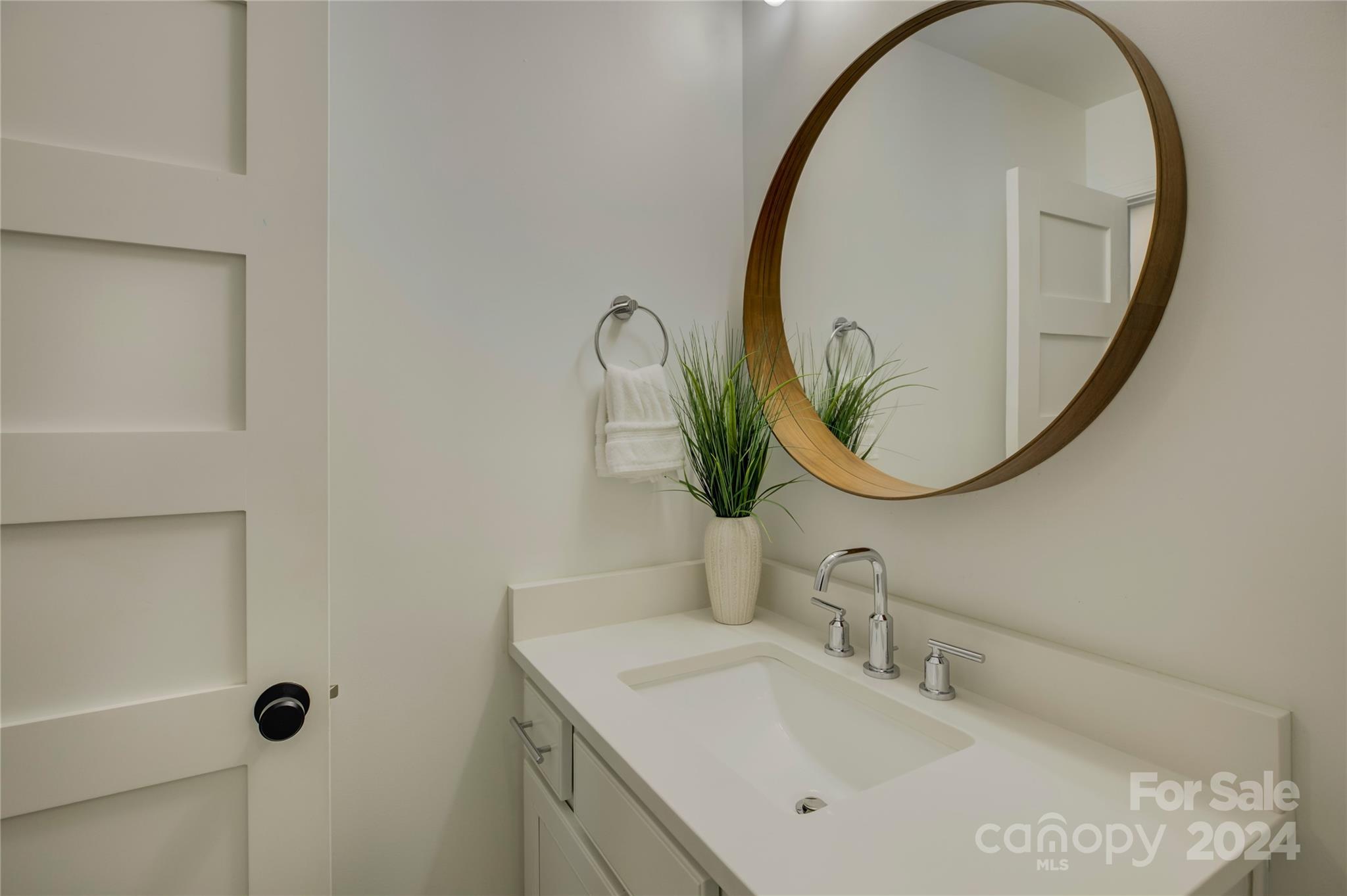 3478 Richard's Crossing Fort Mill, SC 29708 - Photo 20 of 30 a bathroom with a sink and a mirror