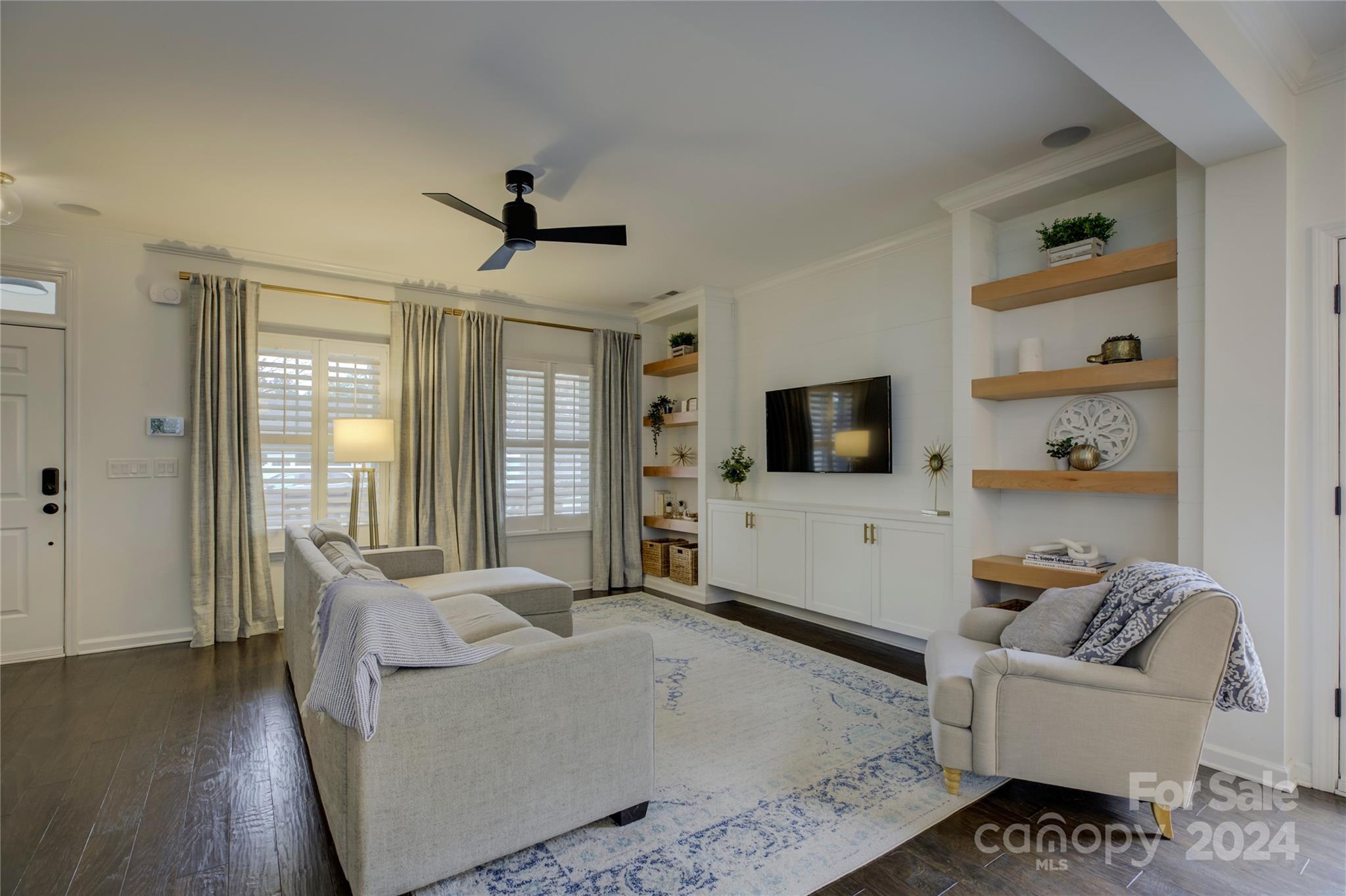 3478 Richard's Crossing Fort Mill, SC 29708 - Photo 3 of 30 a living room with furniture and a flat screen tv