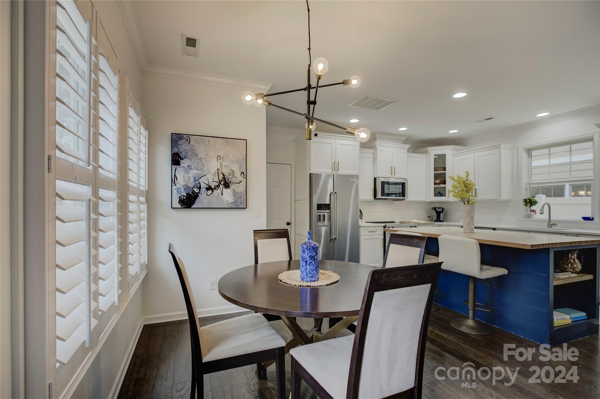 3478 Richard's Crossing Fort Mill, SC 29708 - Photo 9 of 30 a view of a dining room with furniture and wooden floor