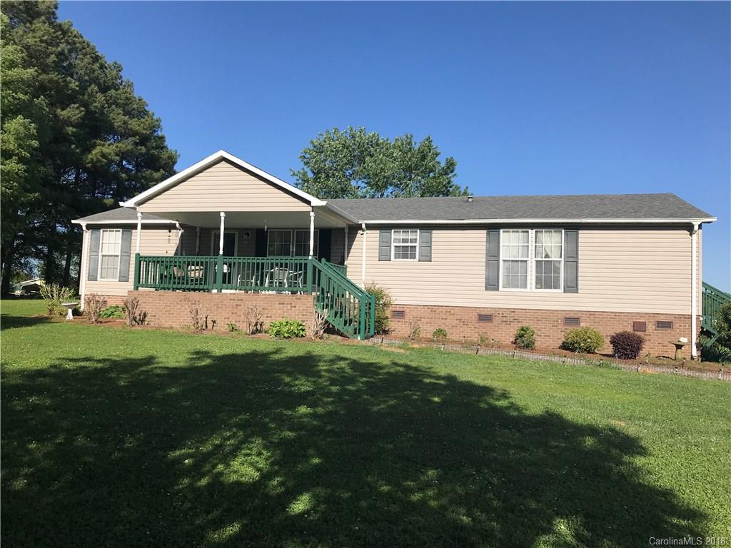 1826 Requa Road Cherryville, NC 28021 - Photo 1 of 24 a front view of a house with a yard