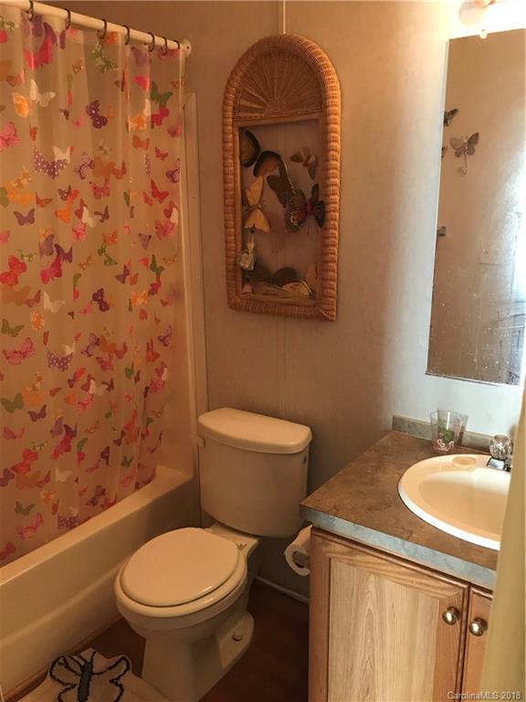 1826 Requa Road Cherryville, NC 28021 - Photo 14 of 24 a bathroom with a toilet and a sink