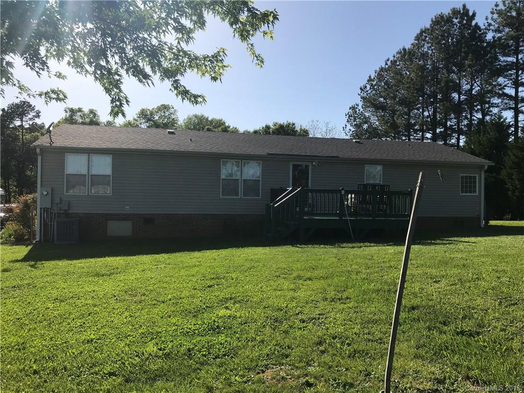1826 Requa Road Cherryville, NC 28021 - Photo 22 of 24 a backyard of a house with lots of green space