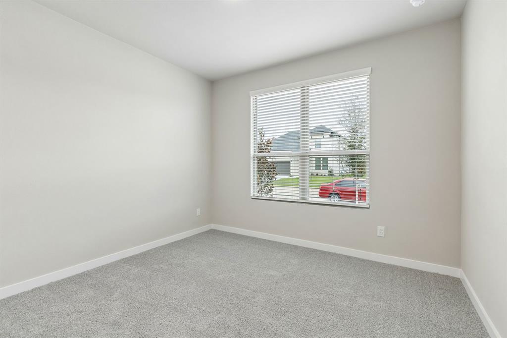 1121 Del Rio Drive Lavon, TX 75166 - Photo 22 of 32 an empty room with windows