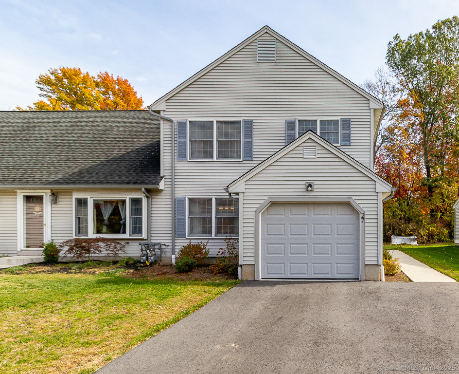 27 Deer Run Trail Manchester, CT 06042 - Photo 1 of 40 a front view of a house with a yard outdoor seating and garage