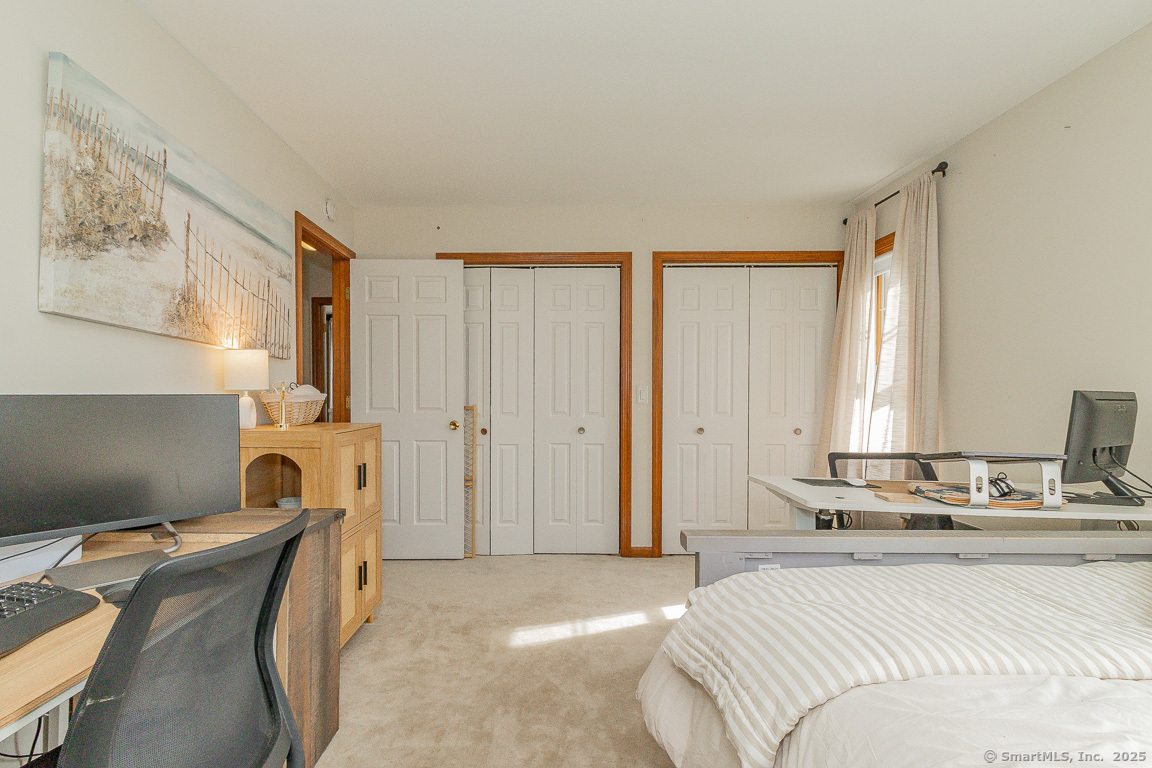 27 Deer Run Trail Manchester, CT 06042 - Photo 26 of 40 a bedroom with a bed and a window