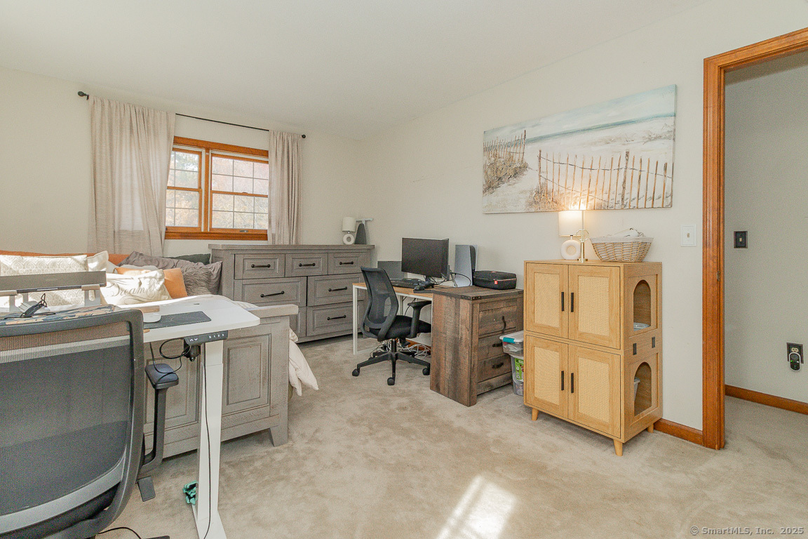 27 Deer Run Trail Manchester, CT 06042 - Photo 28 of 40 a view of a kitchen with fridge and workspace