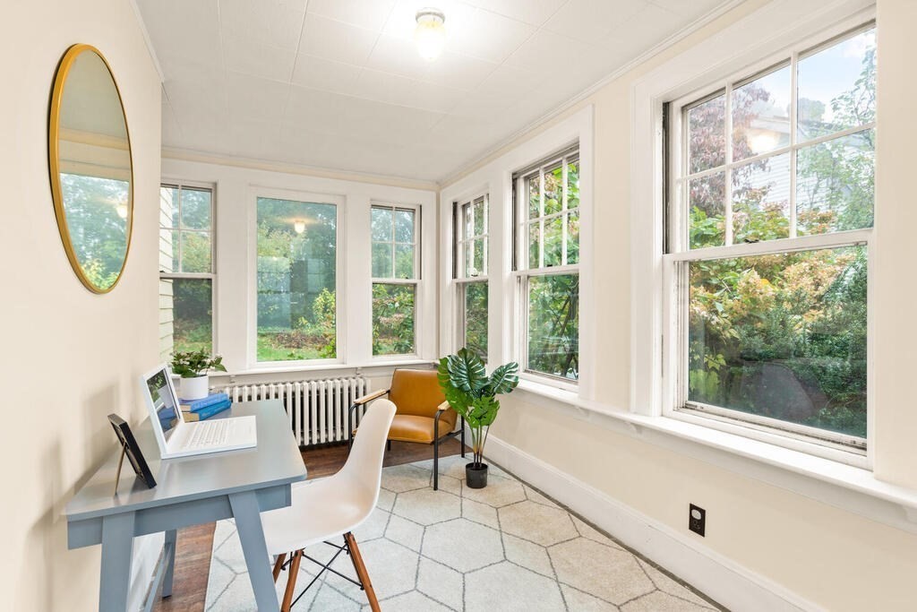 67 Coolidge Road Arlington, MA 02476 - Photo 14 of 34 a living room with furniture and a window