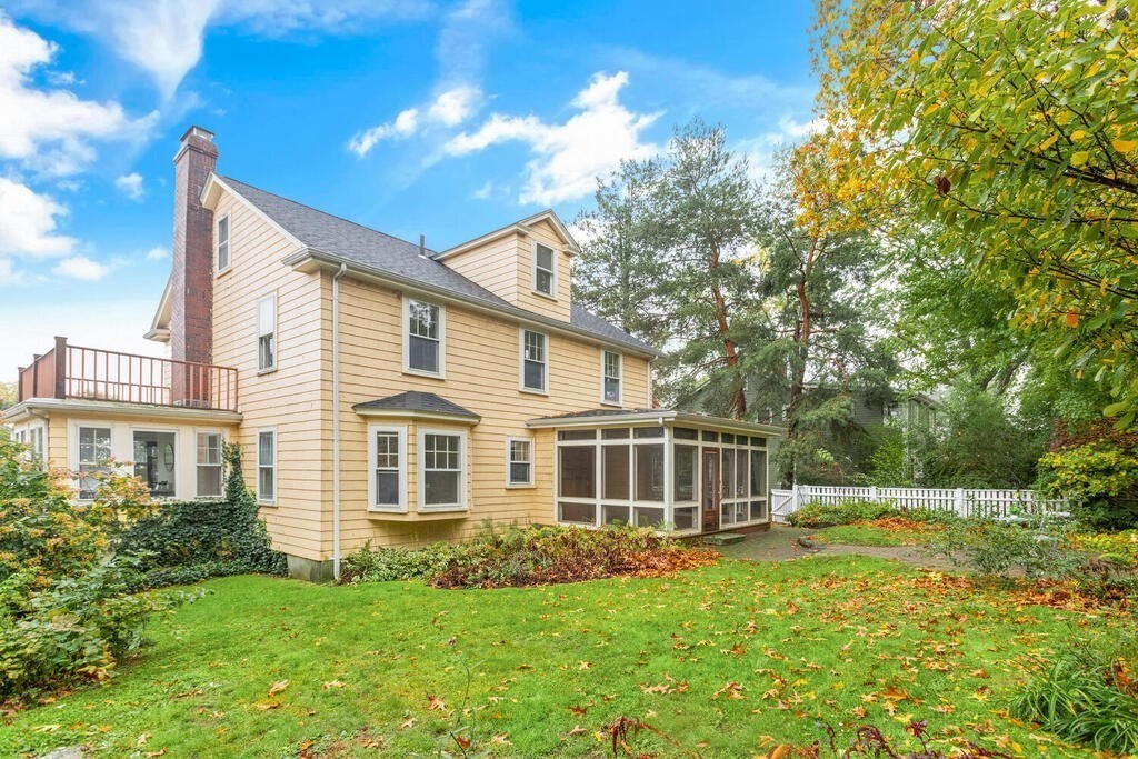 67 Coolidge Road Arlington, MA 02476 - Photo 28 of 34 a view of a house with backyard and garden
