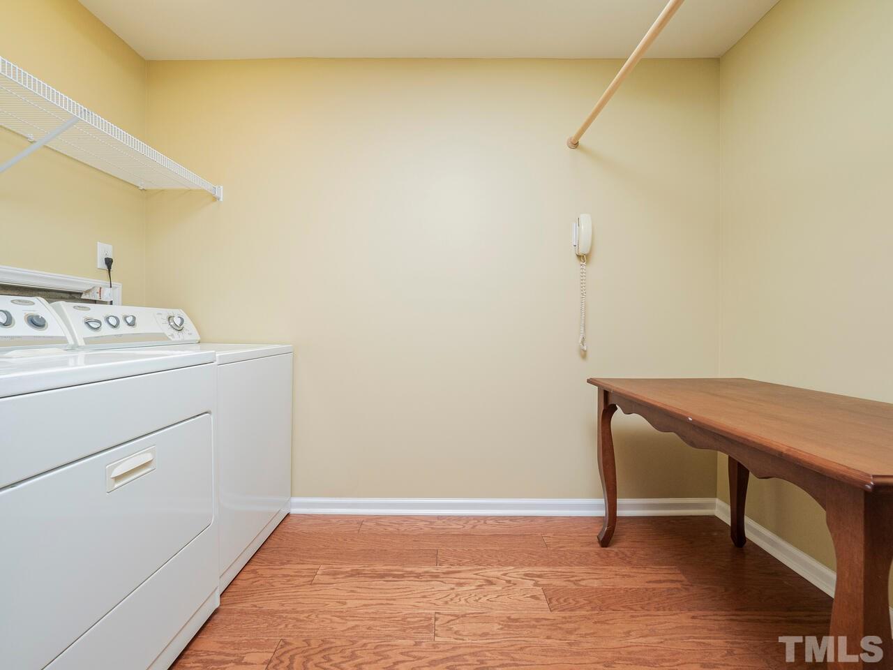 4604 Fernham Place Raleigh, NC 27612 - Photo 16 of 30 a room with a table and chairs