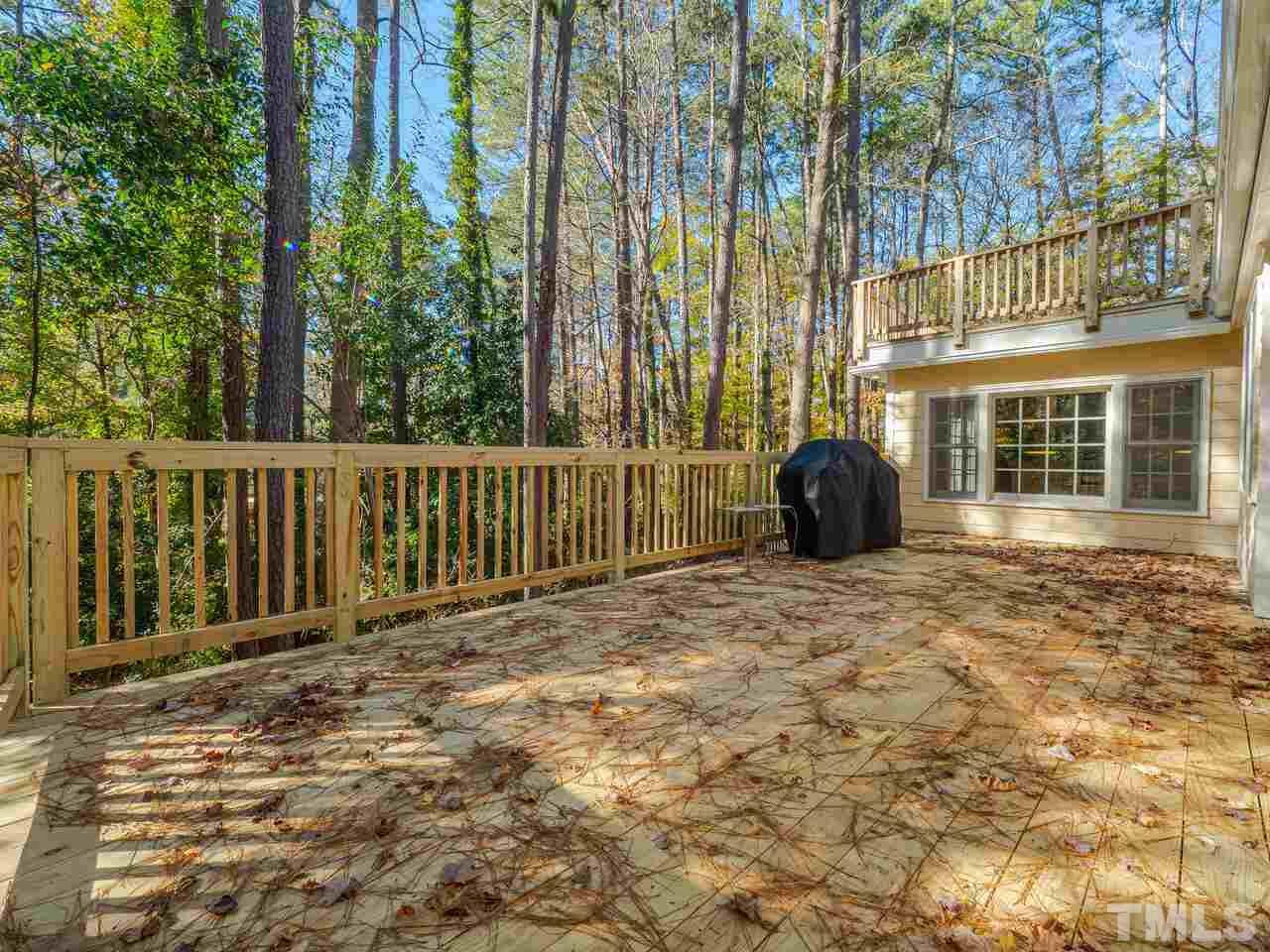 4604 Fernham Place Raleigh, NC 27612 - Photo 27 of 30 a view of a backyard with a garden
