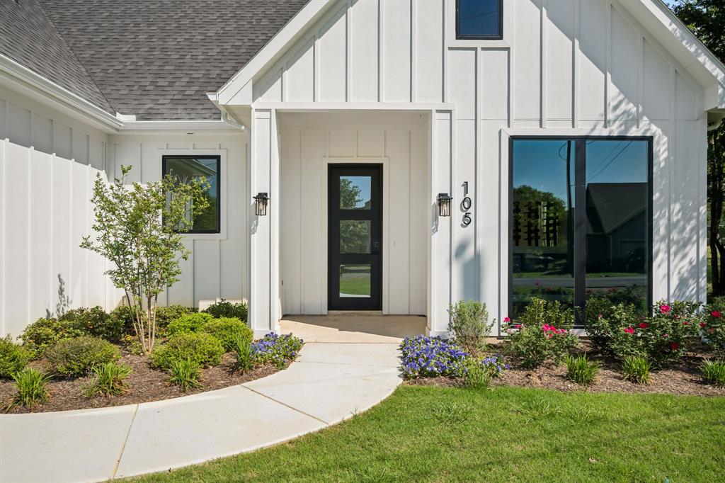 105 Buckboard Trail Oak Point, TX 75068 - Photo 2 of 27 Lovely, welcoming front door entrance.