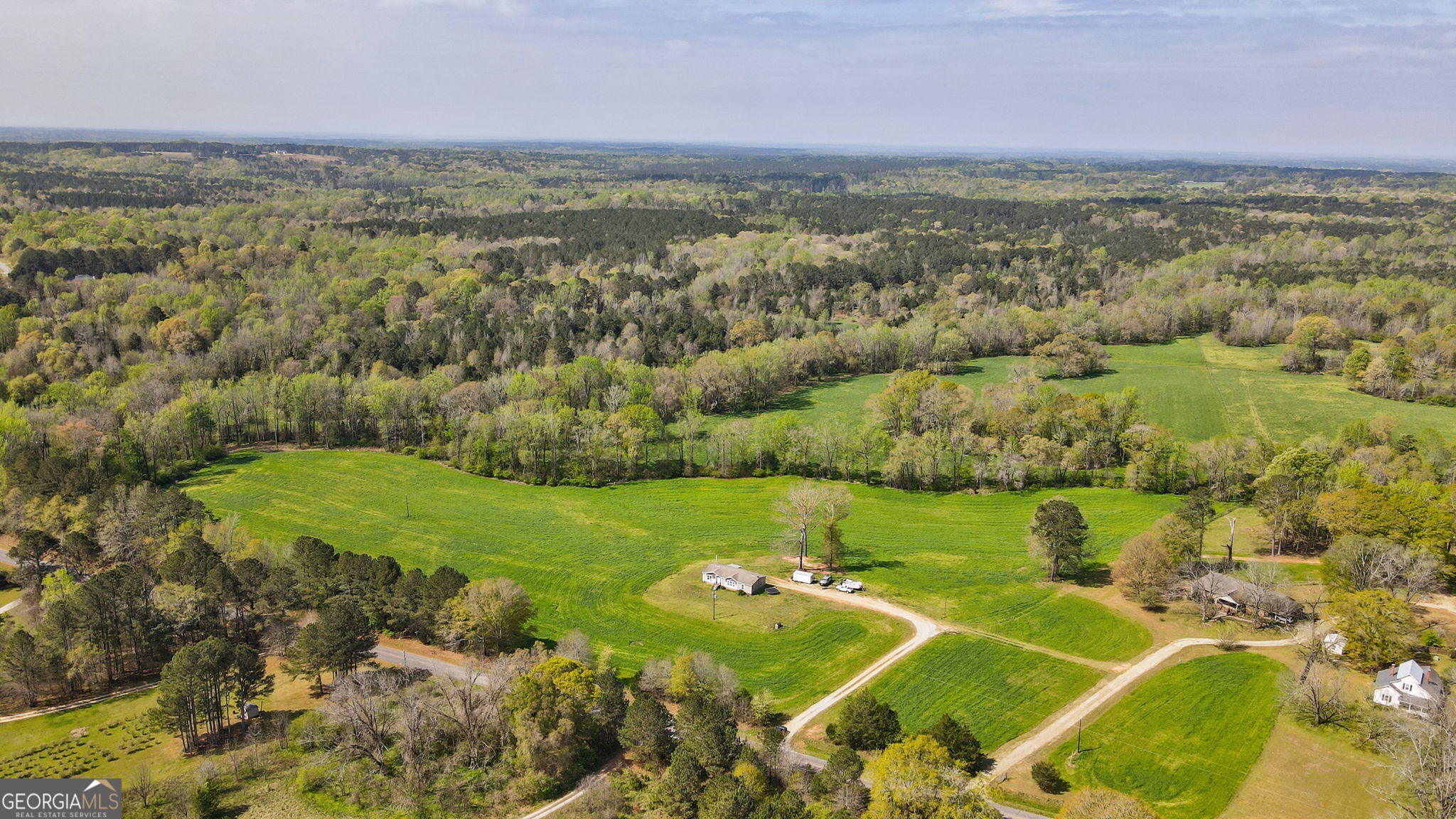 1291 Apalachee River Road Madison, GA 30650 - Photo 5 of 84 a view of a field with an ocean