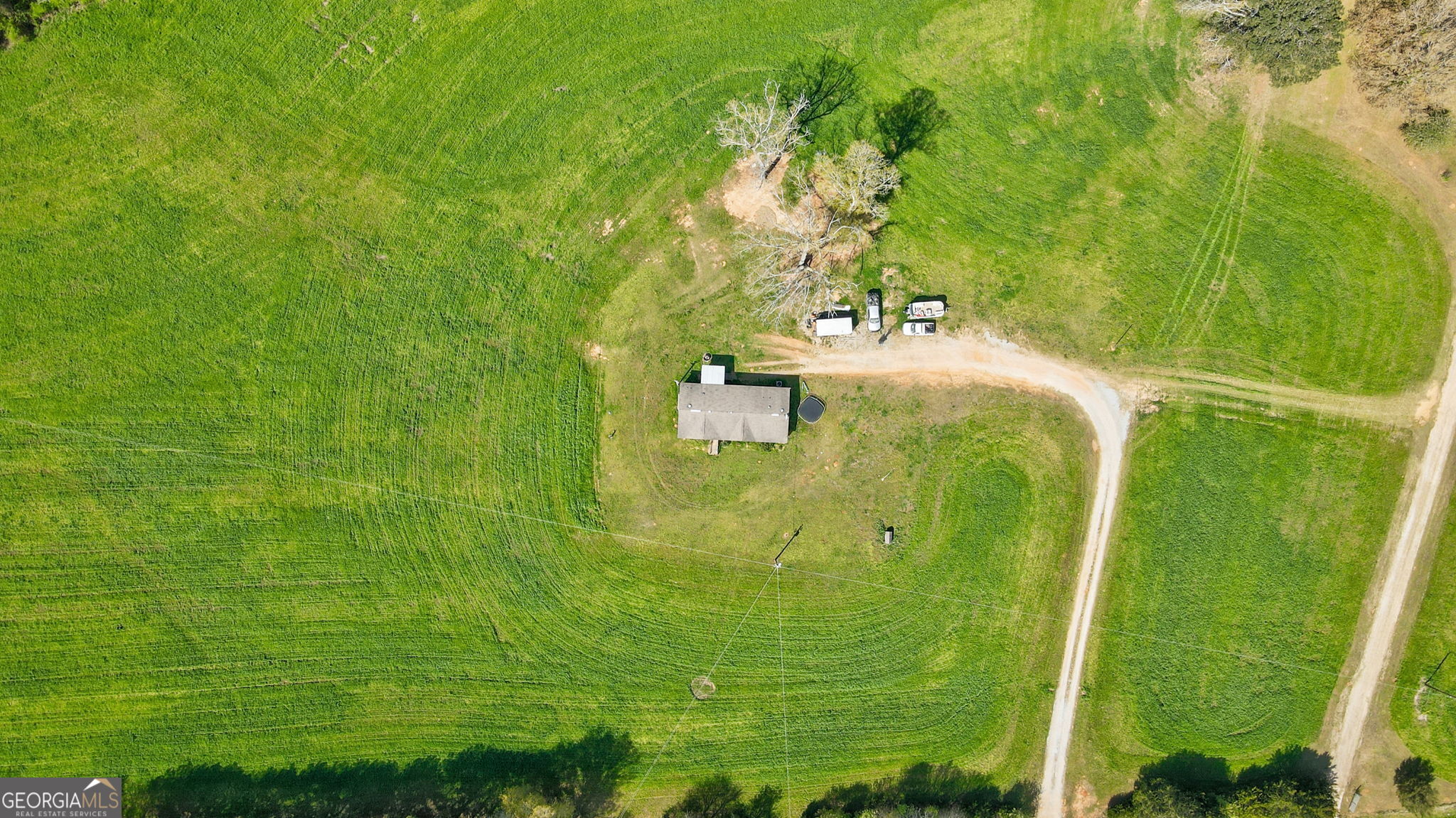 1291 Apalachee River Road Madison, GA 30650 - Photo 9 of 84 a bathroom with a sink and mirror