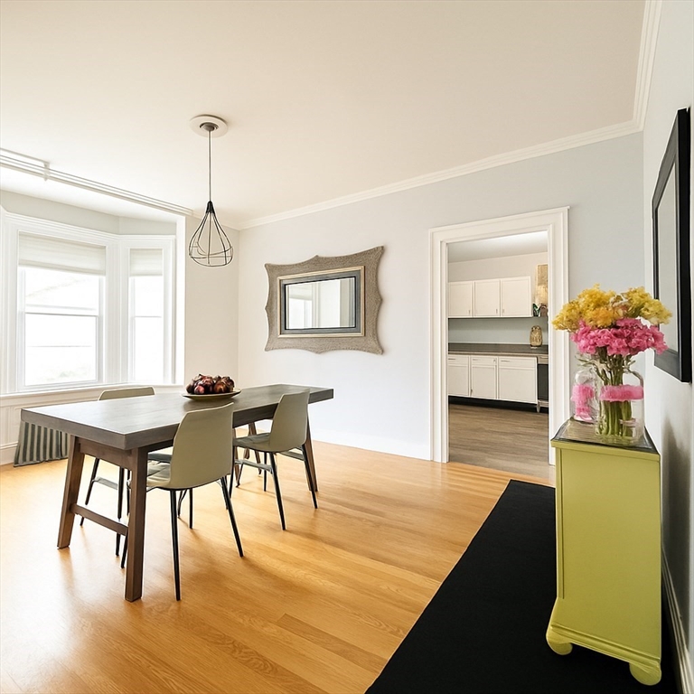 74 Davison Street Boston, MA 02136 - Photo 2 of 20 a view of a dining room with furniture and wooden floor