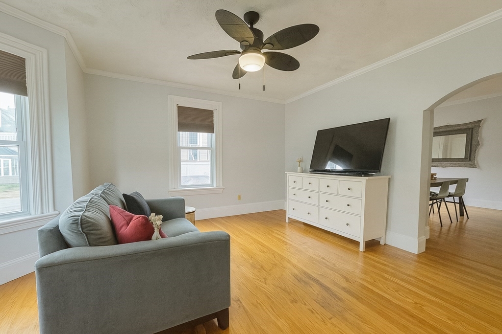 74 Davison Street Boston, MA 02136 - Photo 7 of 20 a living room with furniture and a flat screen tv