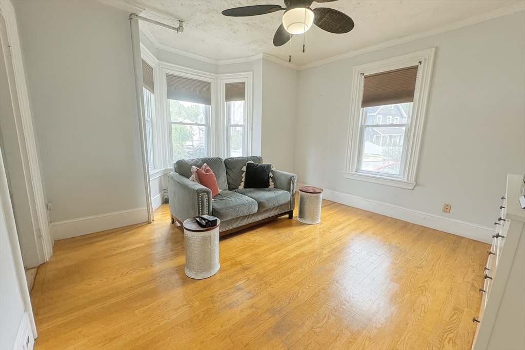 74 Davison Street Boston, MA 02136 - Photo 8 of 20 a living room with furniture and a window