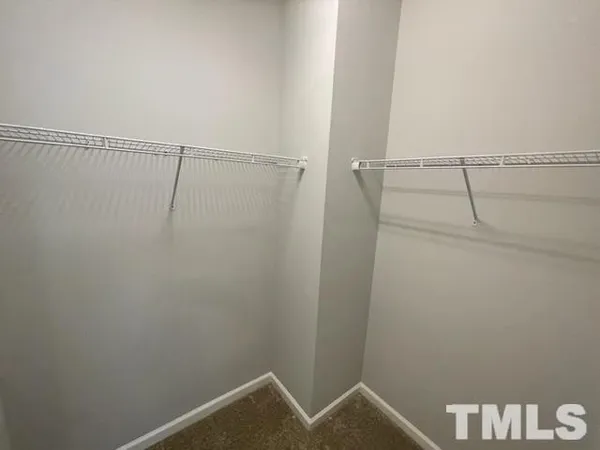 a view of small space with racks on the wall