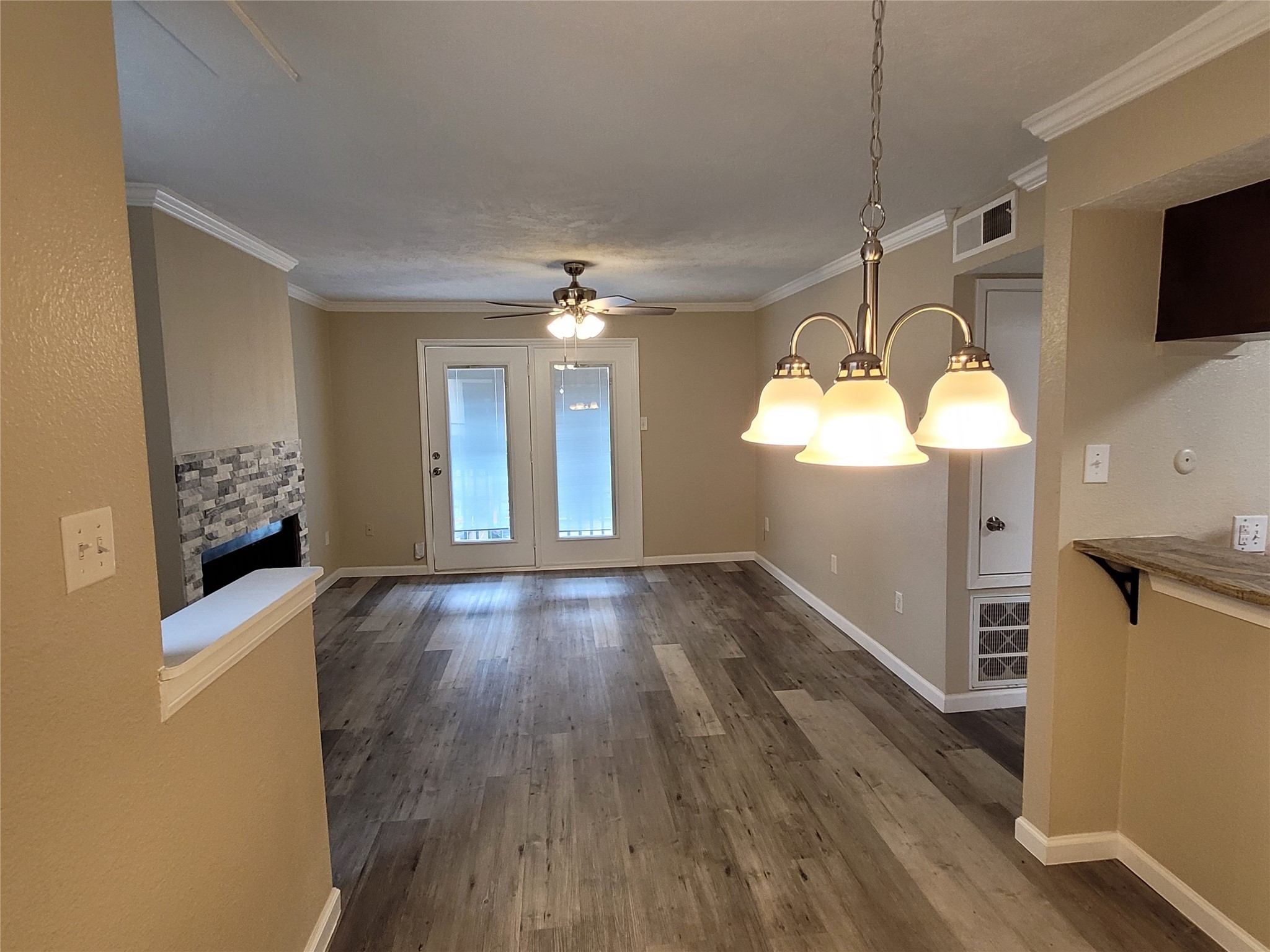 1516 Bay Area Boulevard, Unit S2 Houston, TX 77058 - Photo 5 of 11 a view of a room wooden floor and window