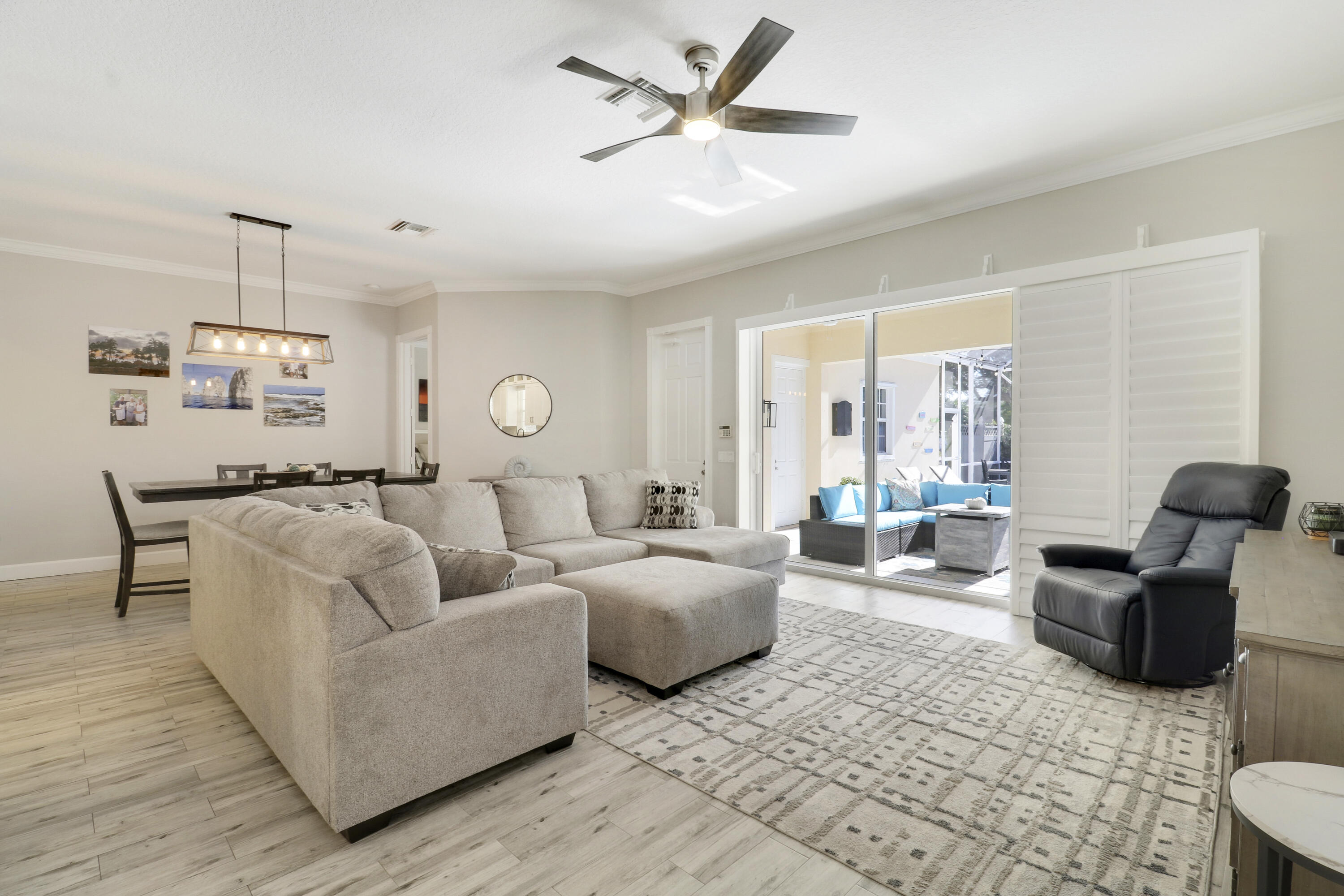 138 Newcastle Drive Jupiter, FL 33458 - Photo 14 of 44 a living room with furniture and a large window