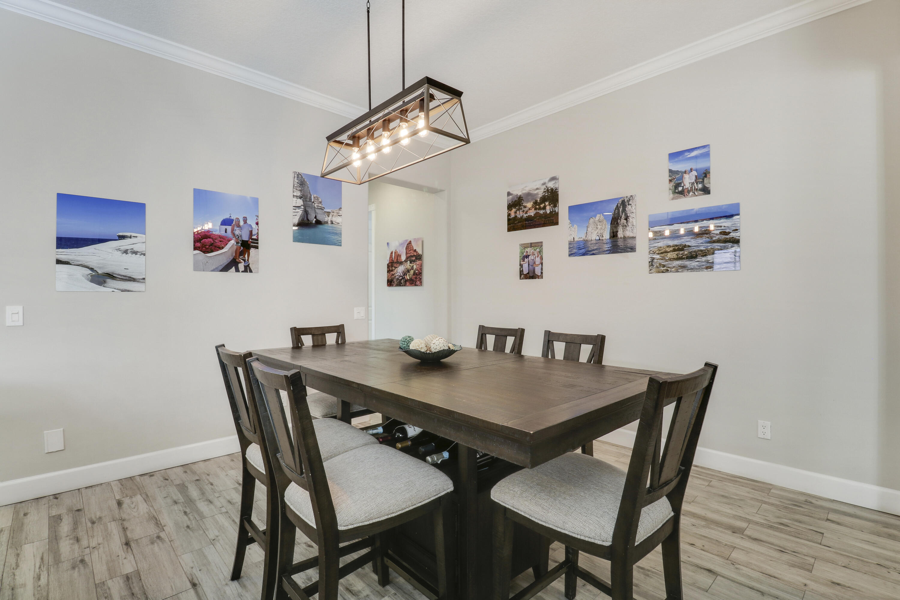 138 Newcastle Drive Jupiter, FL 33458 - Photo 16 of 44 a view of a dining room with furniture and wooden floor