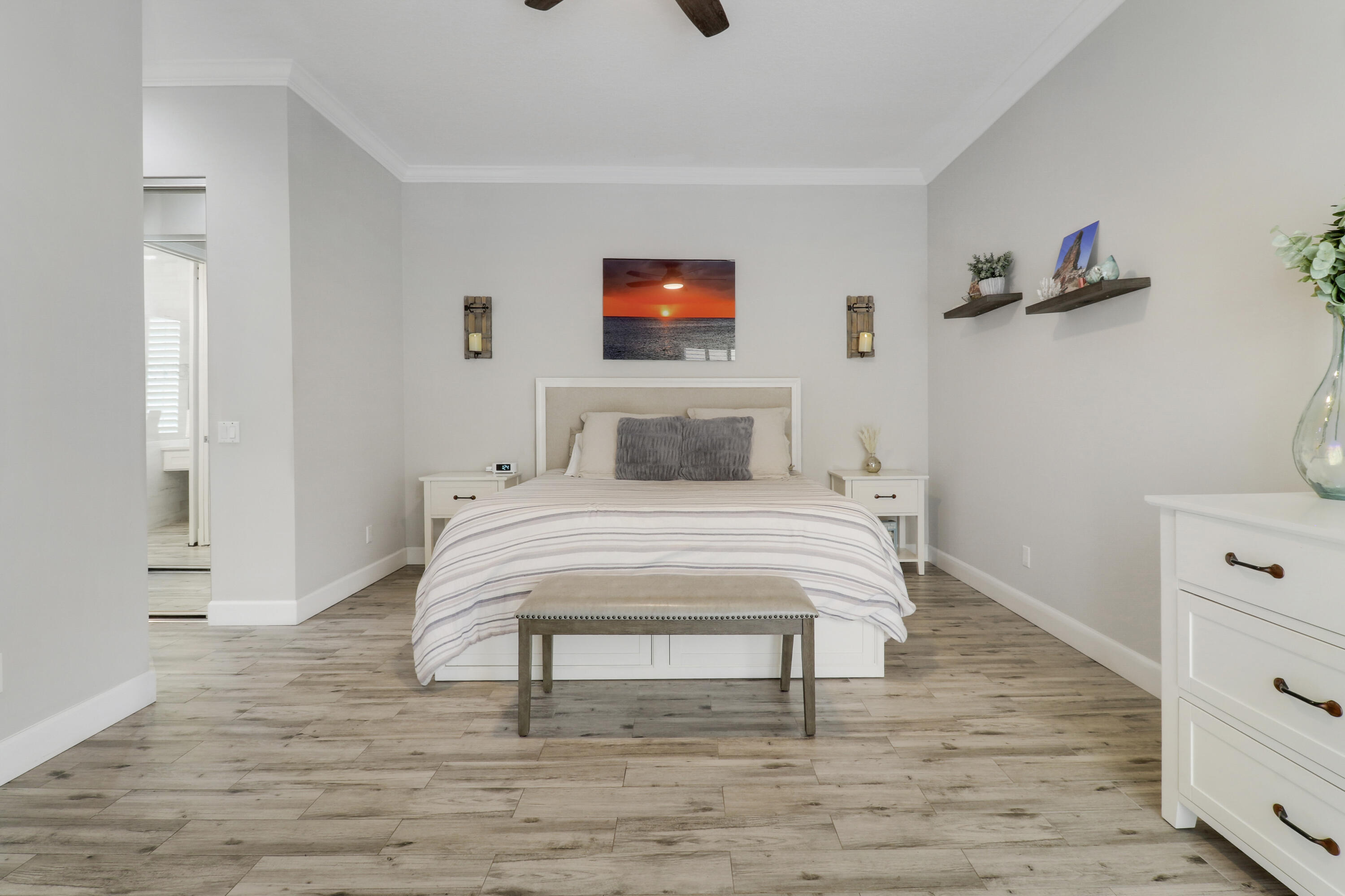 138 Newcastle Drive Jupiter, FL 33458 - Photo 18 of 44 a bedroom with a bed and a flat screen tv