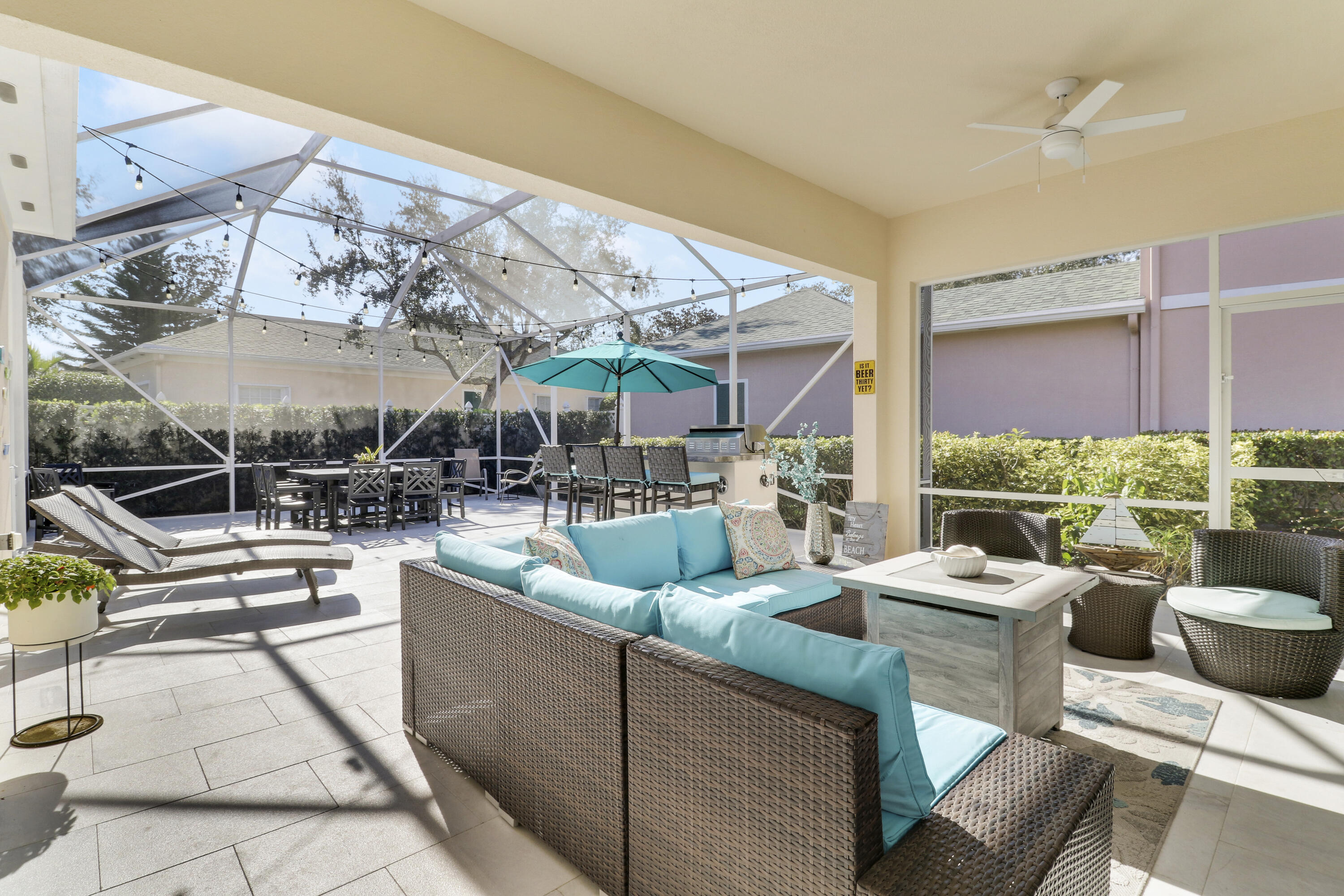138 Newcastle Drive Jupiter, FL 33458 - Photo 29 of 44 a view of a patio with couches chairs dining table and chairs