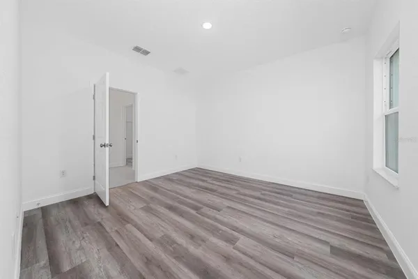 a view of a room with racks on the wall
