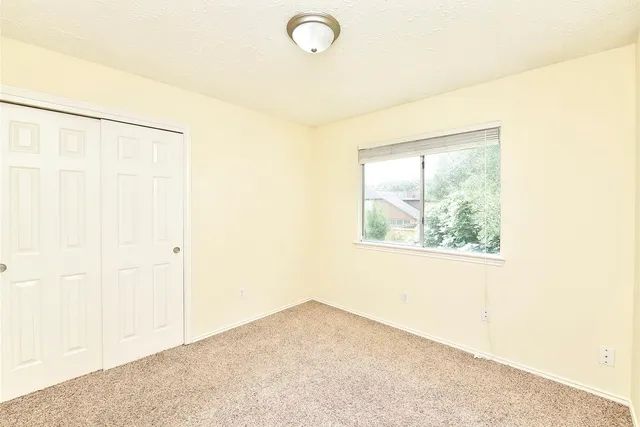 an aerial view of a house with a garden