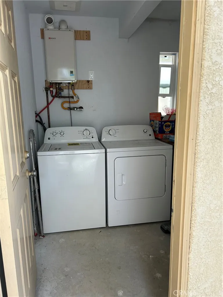 222 9th Street Huntington Beach, CA 92648 - Photo 13 of 13 a utility room with dryer and washer