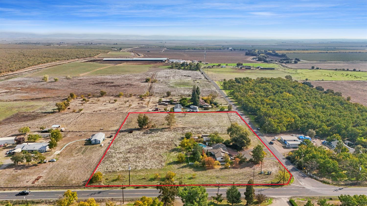 25523 East Groves Road Farmington, CA 95230 - Photo 2 of 65 an aerial view of ocean and residential houses with outdoor space