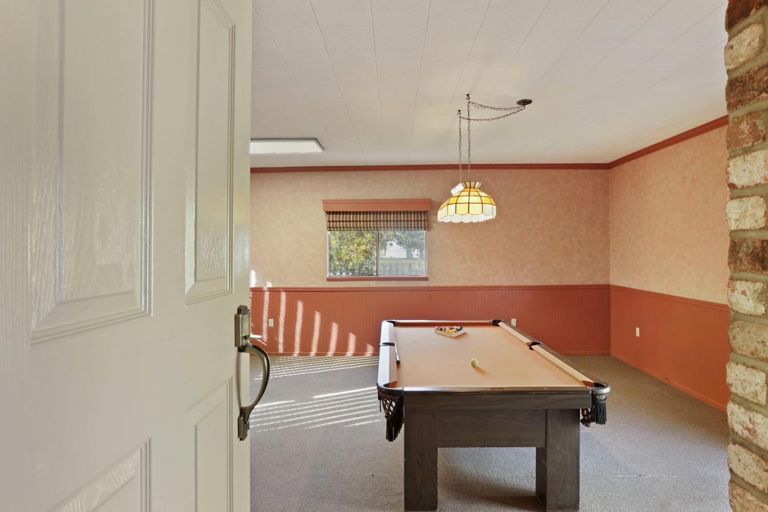 25523 East Groves Road Farmington, CA 95230 - Photo 35 of 65 a view of a room with a table and chairs