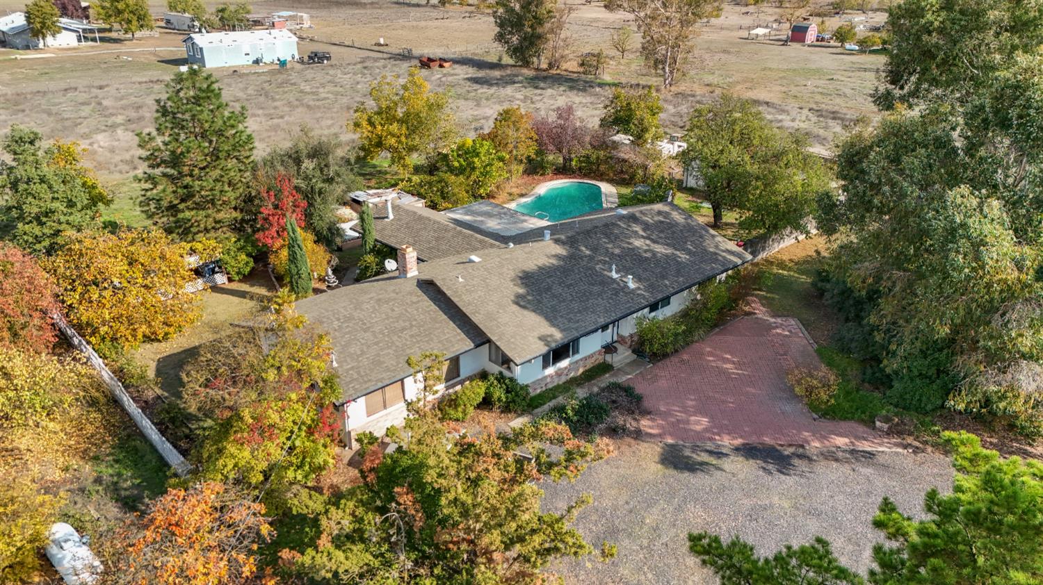 25523 East Groves Road Farmington, CA 95230 - Photo 9 of 65 an aerial view of a house with a yard