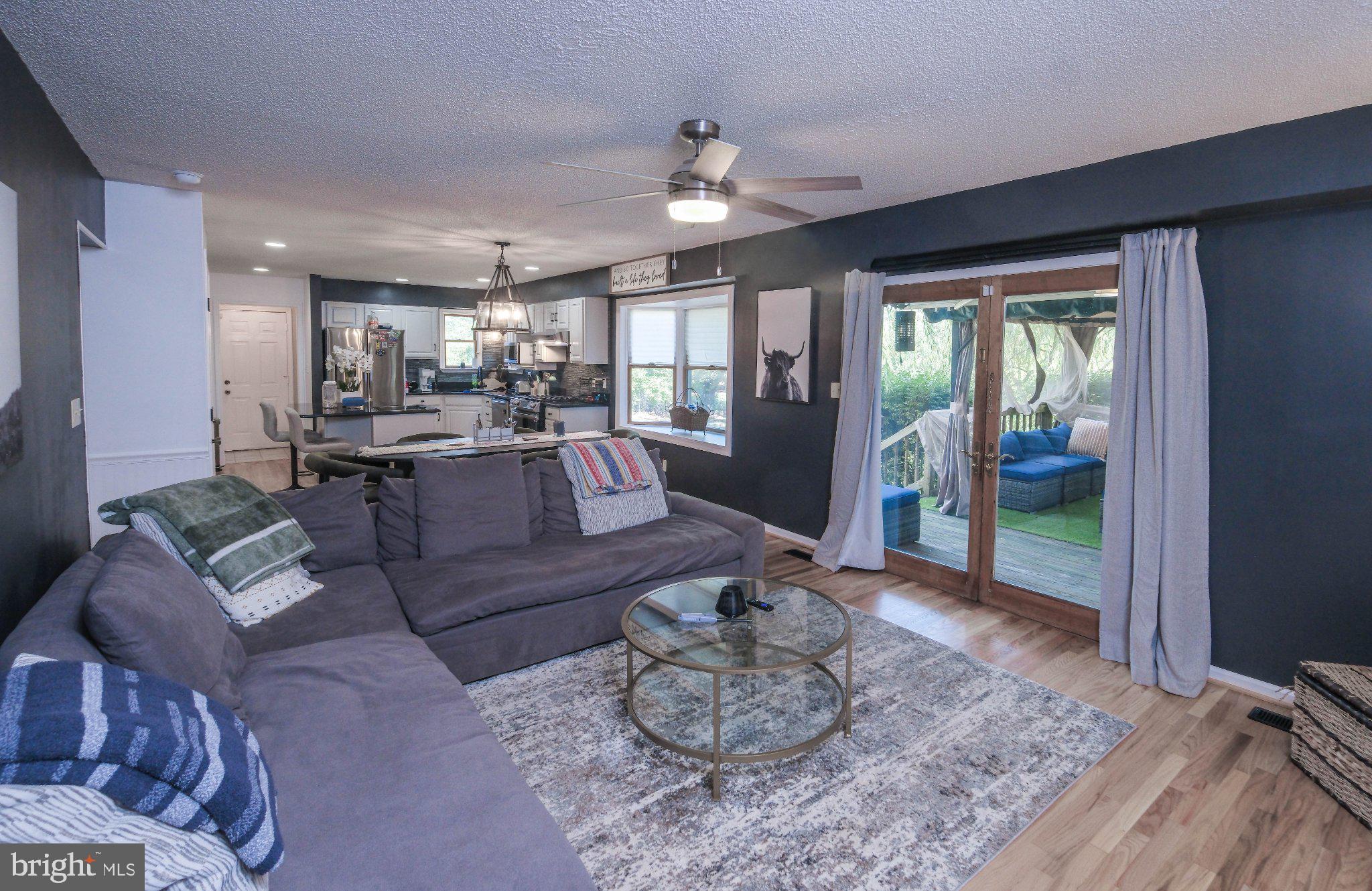 1163 Tasker Road Stephens City, VA 22655 - Photo 13 of 46 Inviting space with seamless outdoor flow.