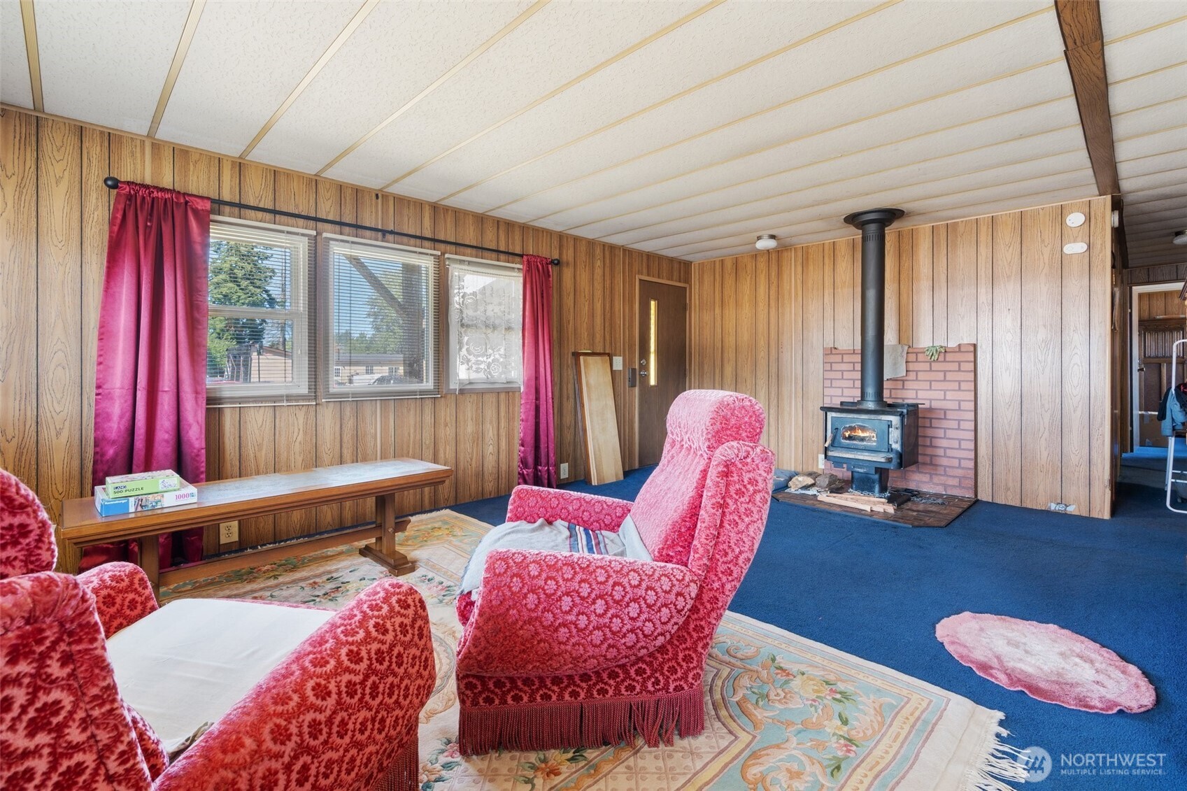 520 North Main Street, Unit F Pe Ell, WA 98572 - Photo 11 of 31 a bedroom with furniture and a wooden floor